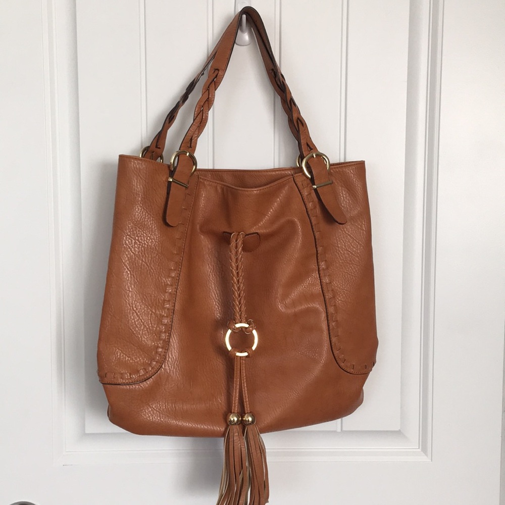 Brown leather handbag with tassel detail